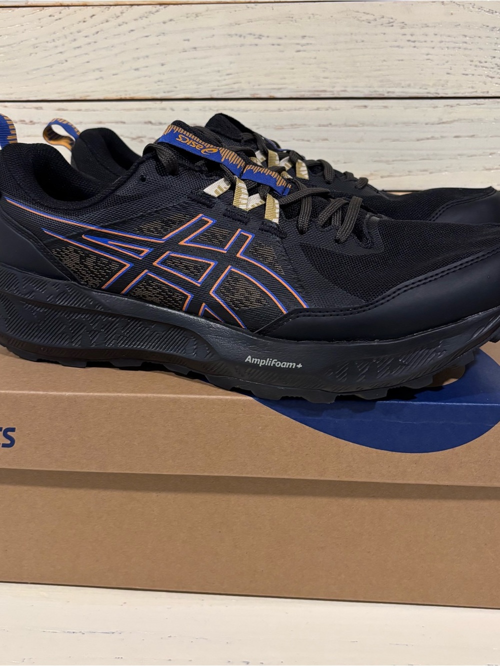 Asics Black Trail Running Shoes with Orange Trim